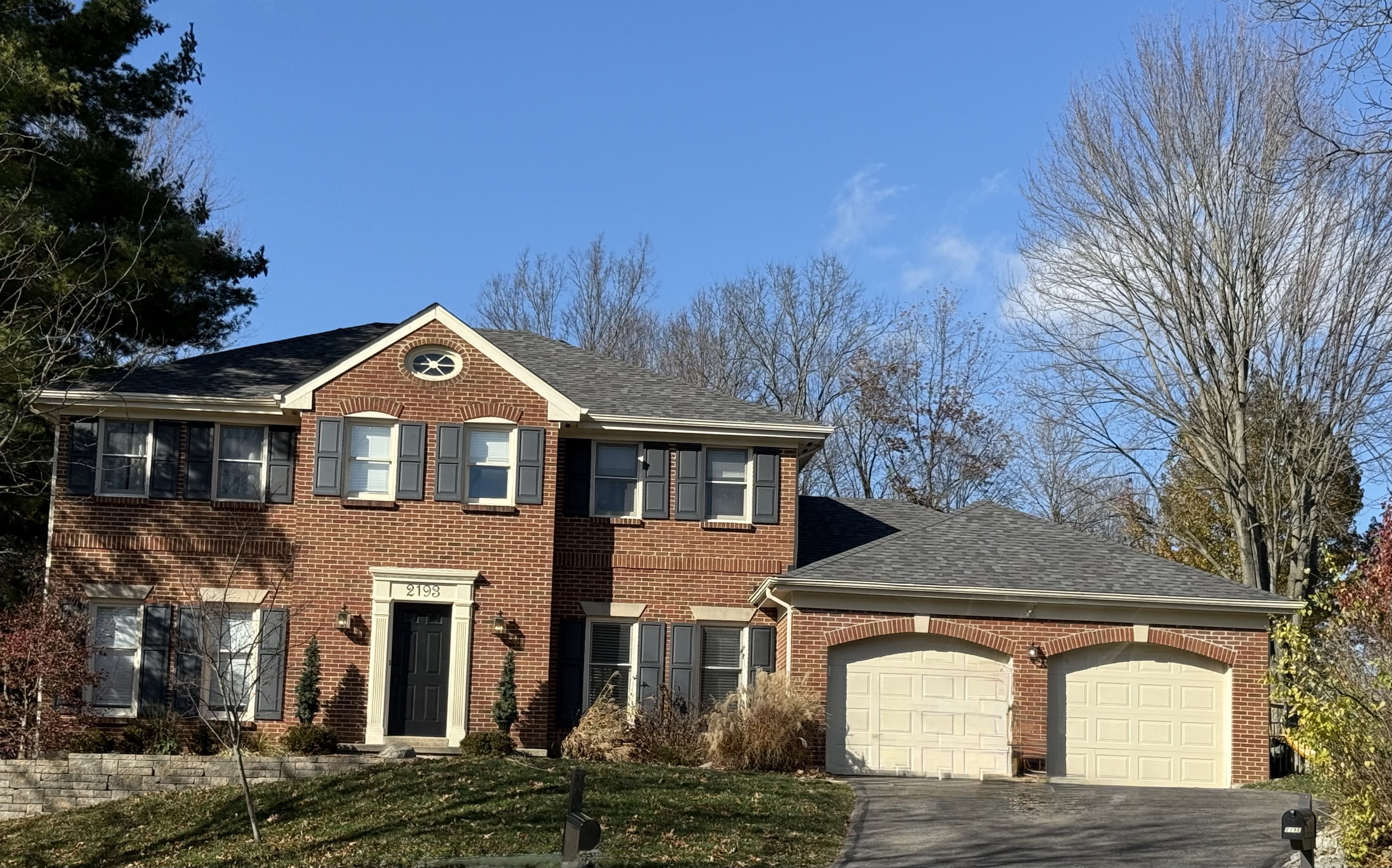 Owens Corning offers 16 different colors for its Duration shingles line. When the owners of this home in Anderson Twp, Ohio decide to get a roof replacement, they chose Williamsburg Grey. It matches the shutters, and offers a nice contrast between the shingles and the red brick. Does your home need a new roof? Call us today to get scheduled.