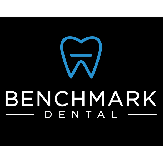 Benchmark Dental Firestone Logo