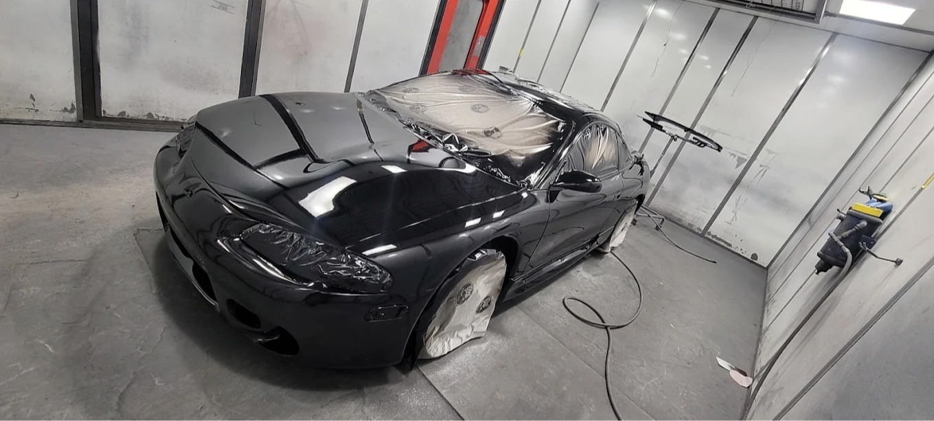 Auto painting at Husteads Auto Body in Berkeley, CA.