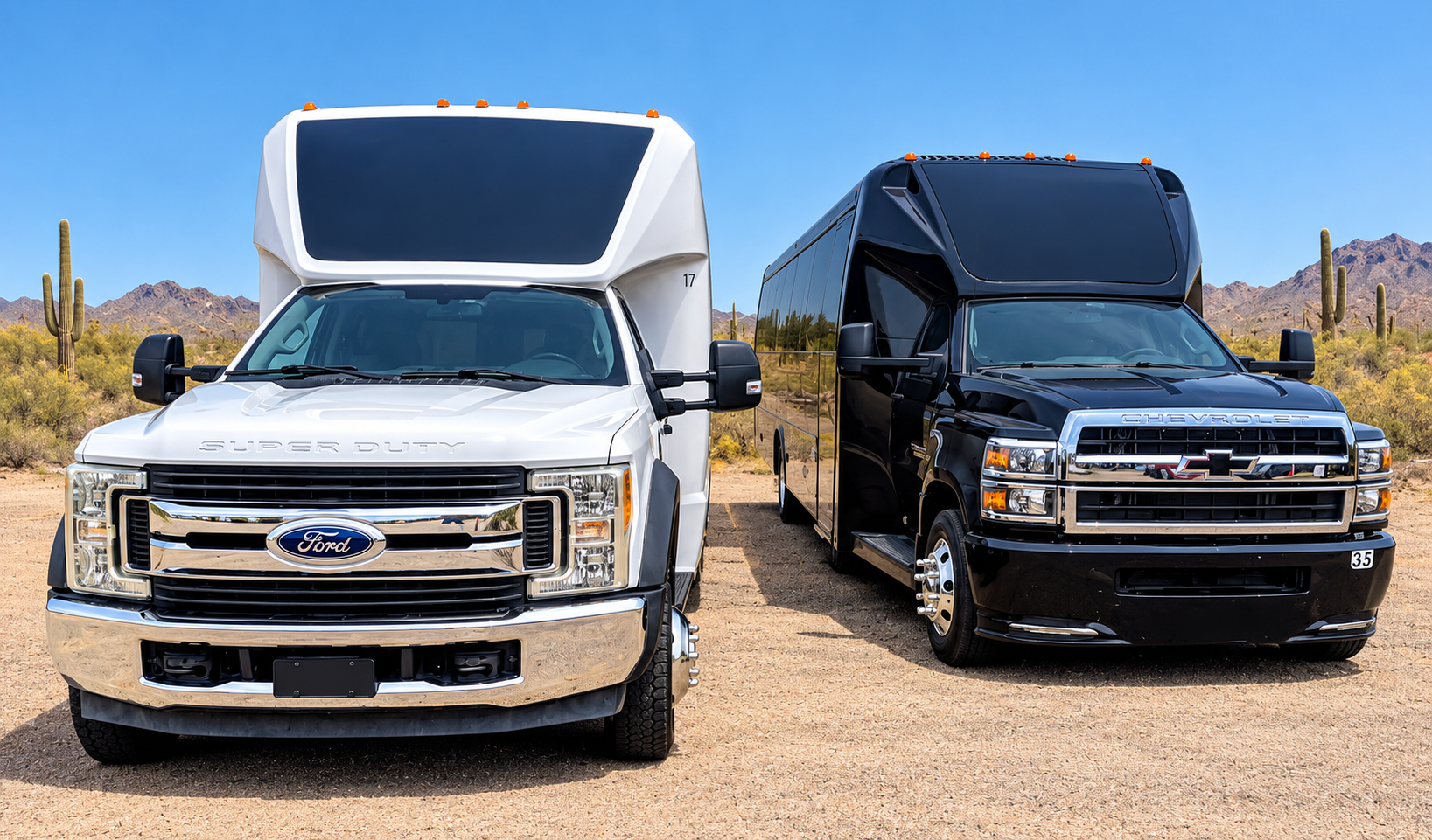 White and black executive shuttle buses in the Tribute Transportation fleet.