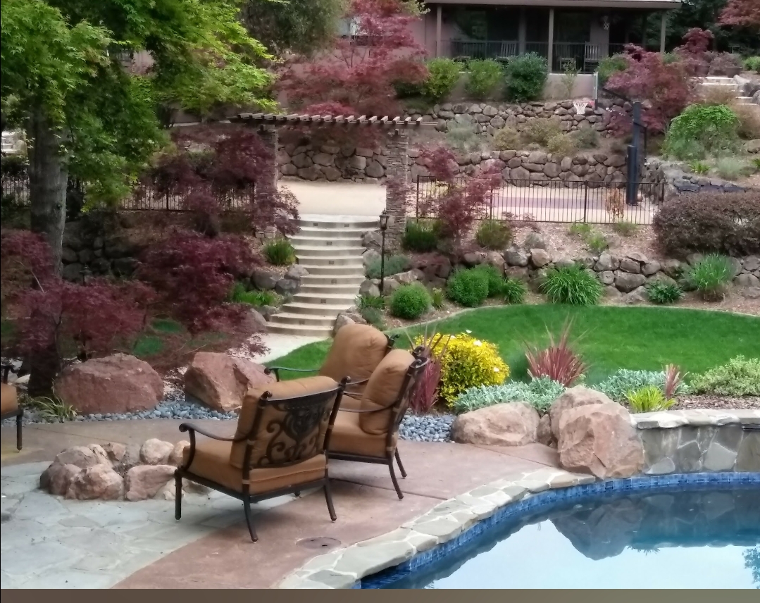 Eric Betz Landscape inc. Logo