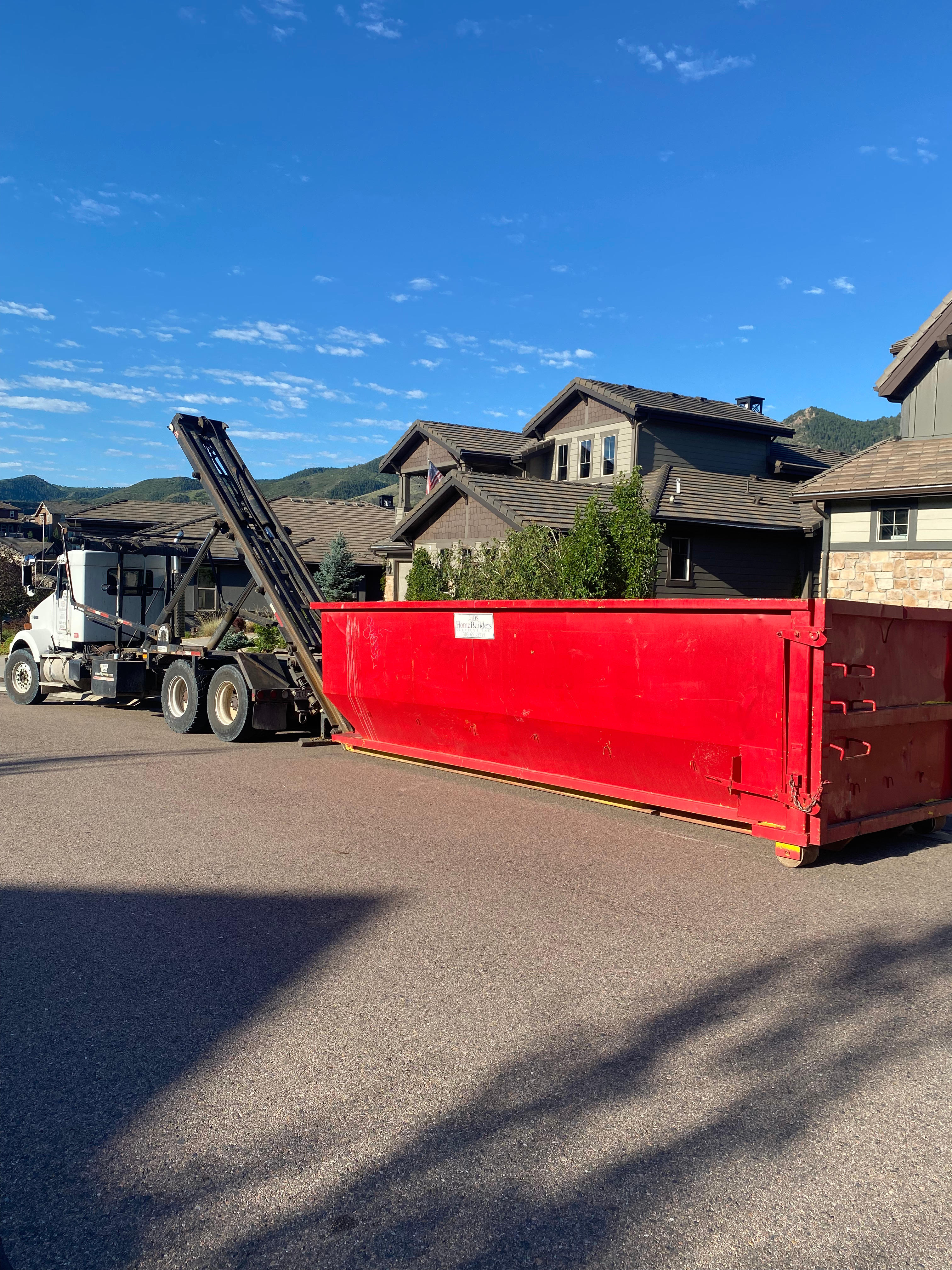 Red roll off dumpster rental in Denver. Discount Dumpster Rental