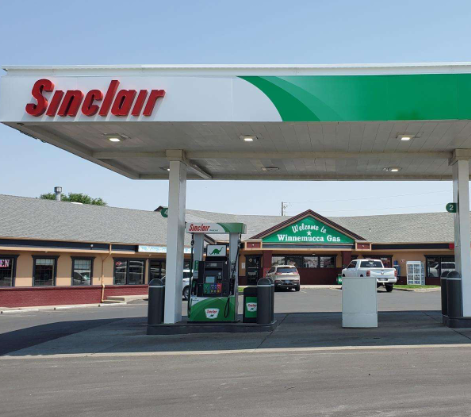 Sinclair gas station fueling island