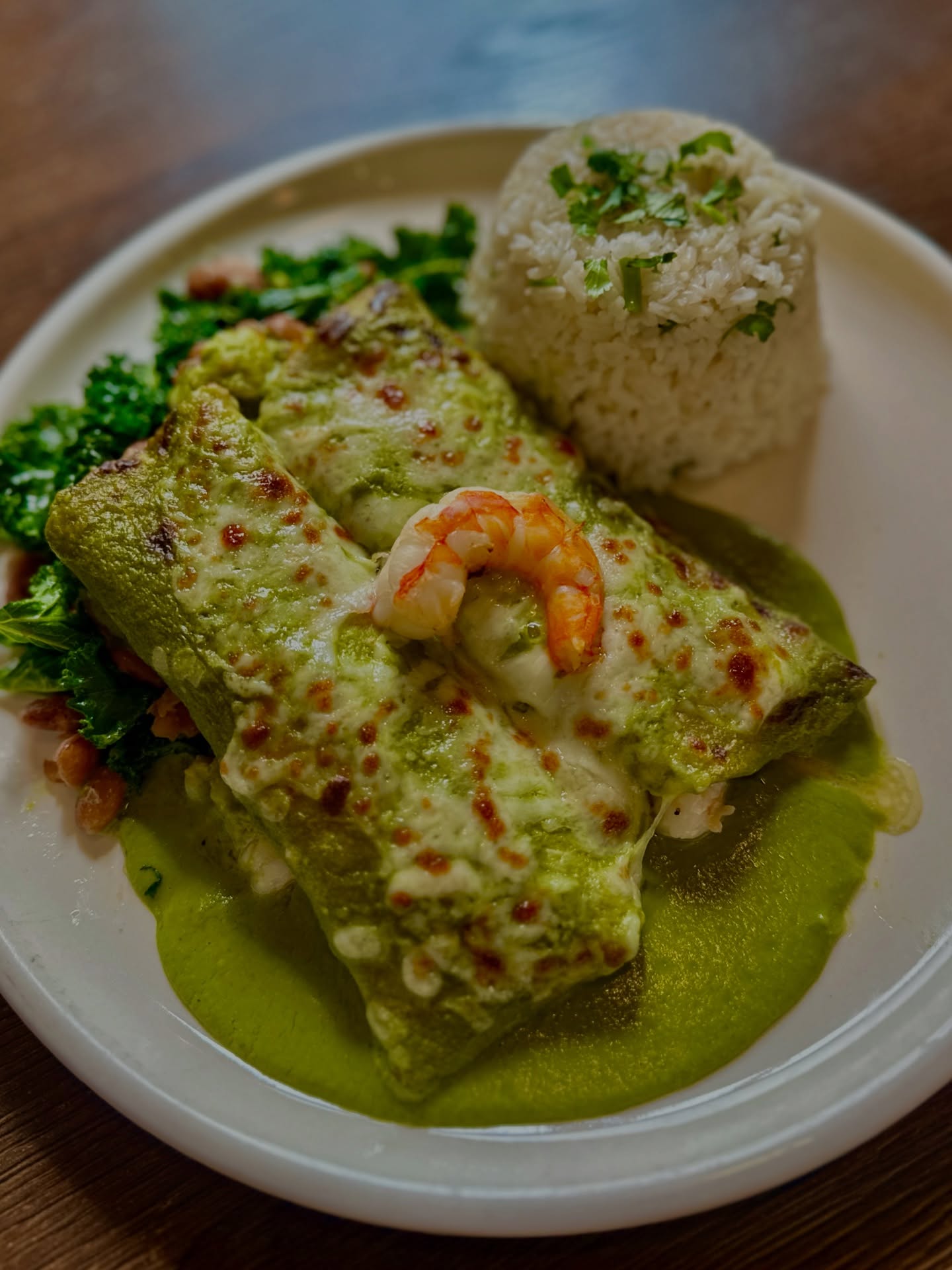 Something new just hit the table 
Shrimp Enchiladas Verde, made with jack cheese, green mole, cilantro rice, seared kale & pinto beans.
Wash it down with the brand new Ruby Red Skinny Margarita  Built with fresh Texas Red Star grapefruit and Mediterranean sea salt.
Bright, bold flavors, all done the Rio way.
Grab your crew and come get into it!
