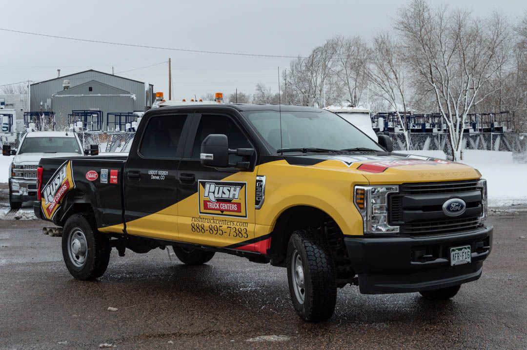 Fleet vehicle wrap for Rush Truck Centers. Fleet graphics installed by Colographic Inc.