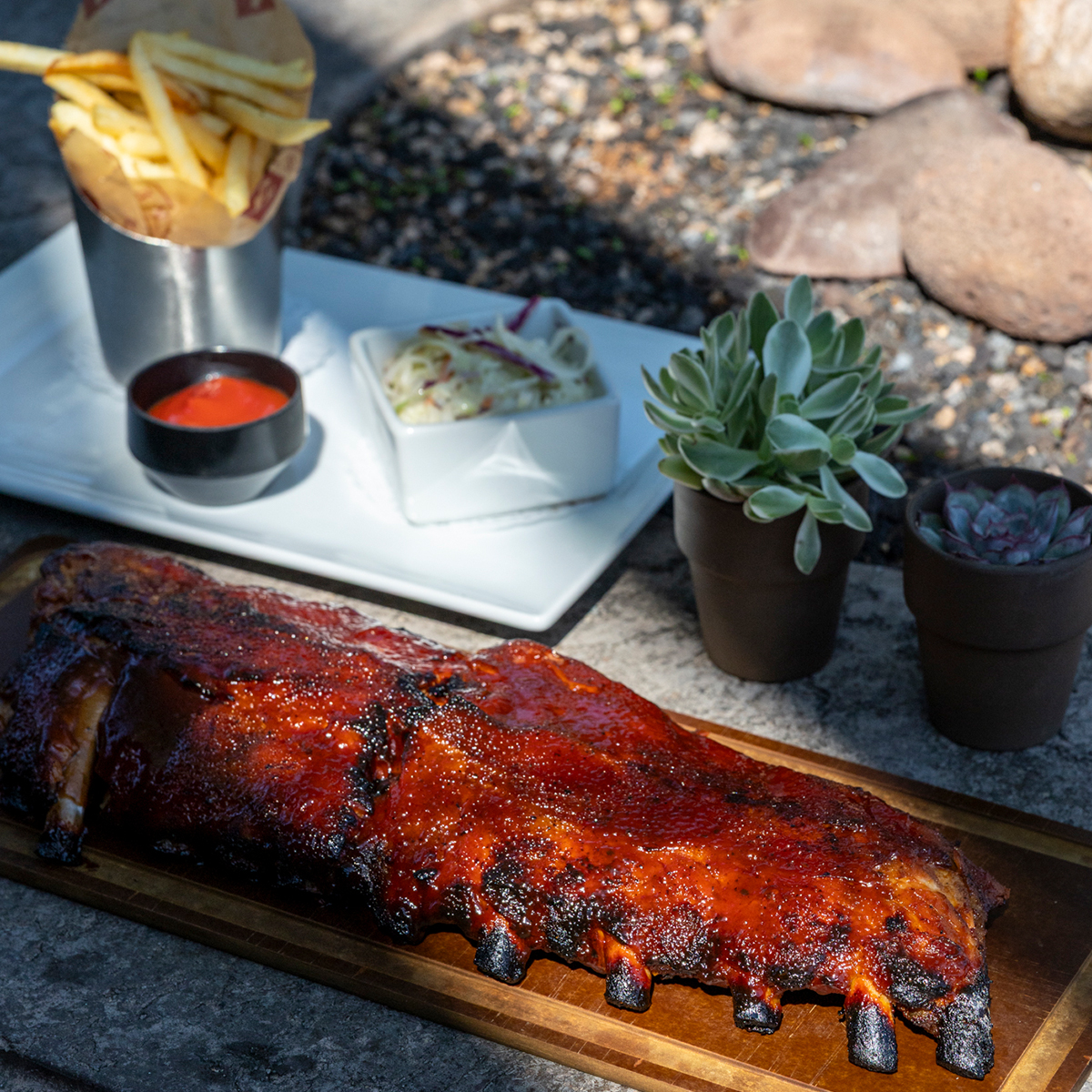 BBQ Baby Back Ribs | full-rack, center cut, wood fired, french fries & coleslaw