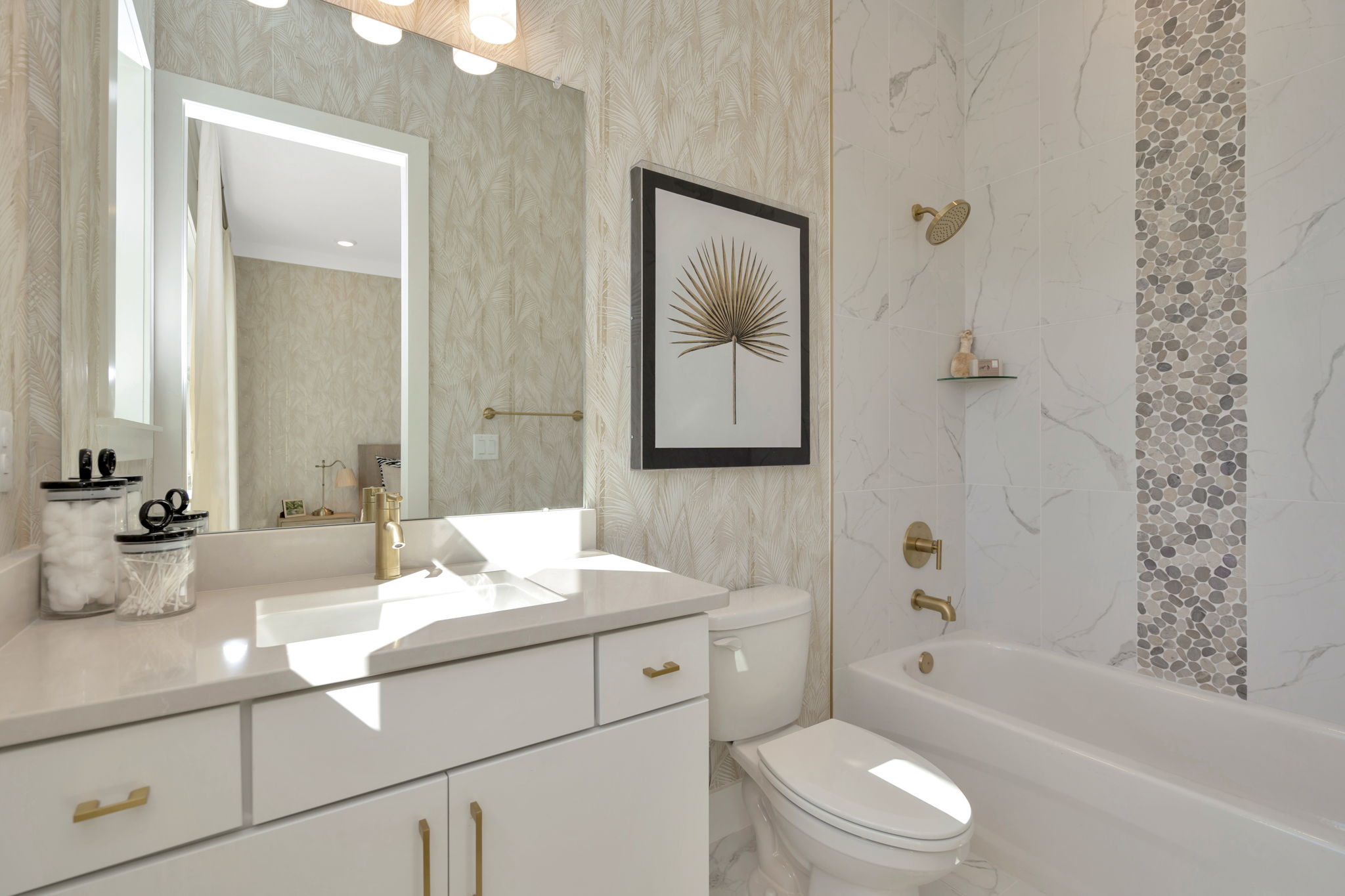 The Second Bathroom of a DRB Homes Sabal Model at Serengeti in Spring Hill, FL.