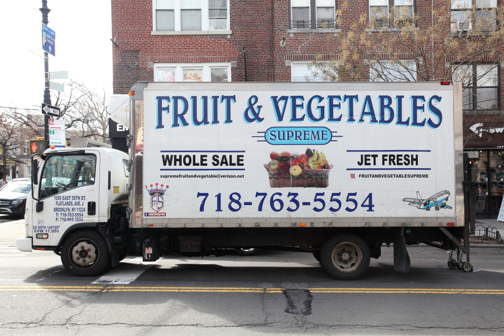 A white box truck with 