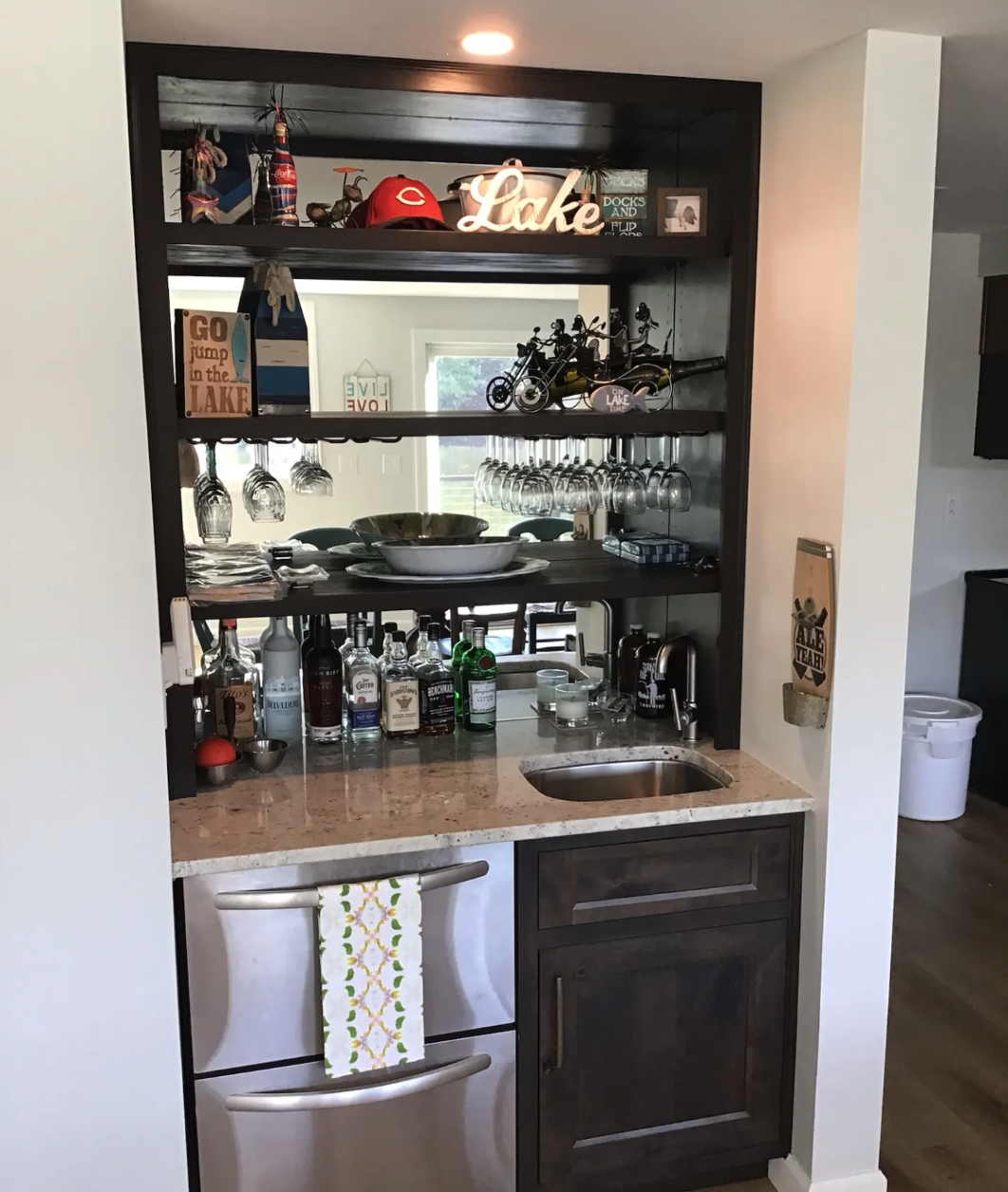 We might love building garages, but we love interior projects just as much! For this home in Oakley, Ohio we added a built-in wet bar. It features a full mirror, adjustable shelving and of course the plumbing for the sink. Do you have an inside project you'd like to this winter? Reach out and get on our schedule.