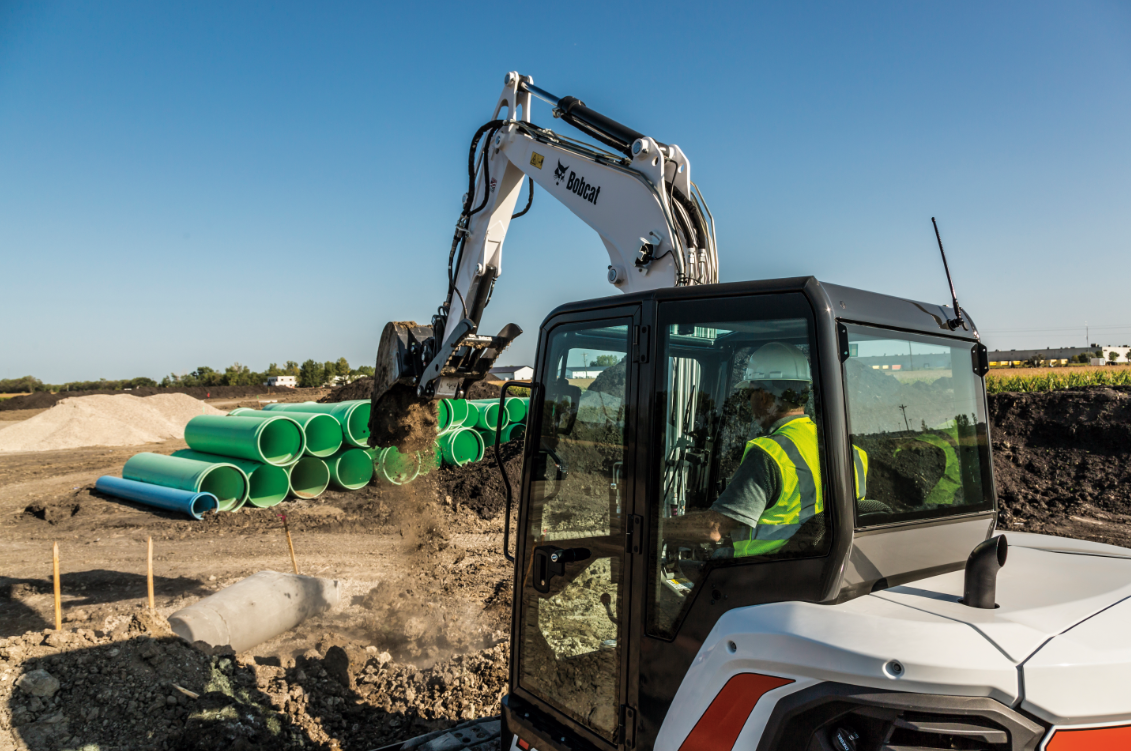 Bobcat Construction Equipment on a construction site moving pieces of material with a large machine  Bobcat of Lima Bellefontaine (937)595-5050