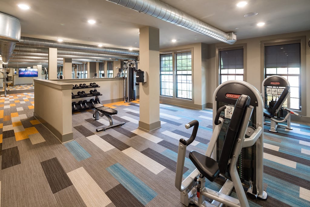 Fitness Center with Cardio, CrossFit & Yoga Components at Echo at North Pointe Center Apartment Homes