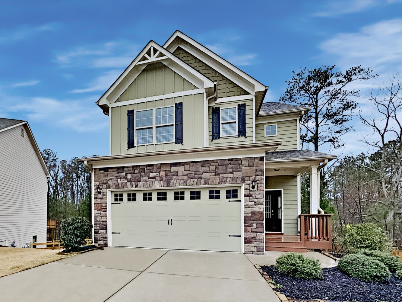 Charming two-story home with a garage at Invitation Homes Atlanta.