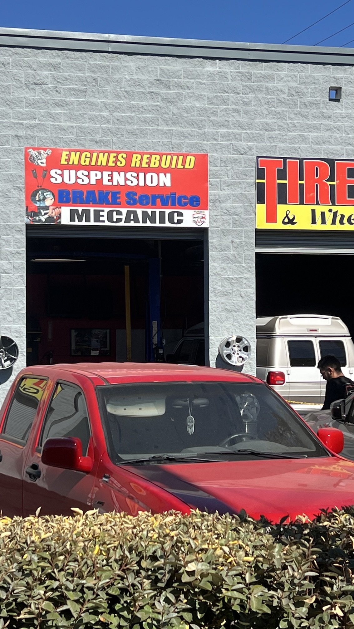 2BleAAuto Mechanic - outside of autoshop 
