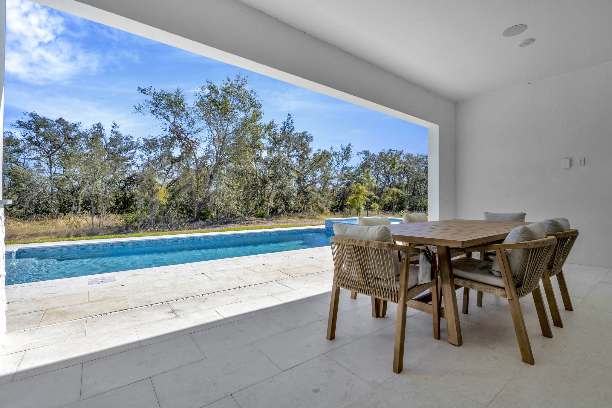 The Covered Lanai of a DRB Homes Sabal Model at Serengeti in Spring Hill, FL.