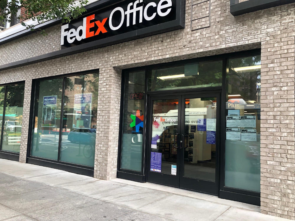 Exterior photo of FedEx Office location at 67 E 8th St\t Print quickly and easily in the self-service area at the FedEx Office location 67 E 8th St from email, USB, or the cloud\t FedEx Office Print & Go near 67 E 8th St\t Shipping boxes and packing services available at FedEx Office 67 E 8th St\t Get banners, signs, posters and prints at FedEx Office 67 E 8th St\t Full service printing and packing at FedEx Office 67 E 8th St\t Drop off FedEx packages near 67 E 8th St\t FedEx shipping near 67 E 8th St