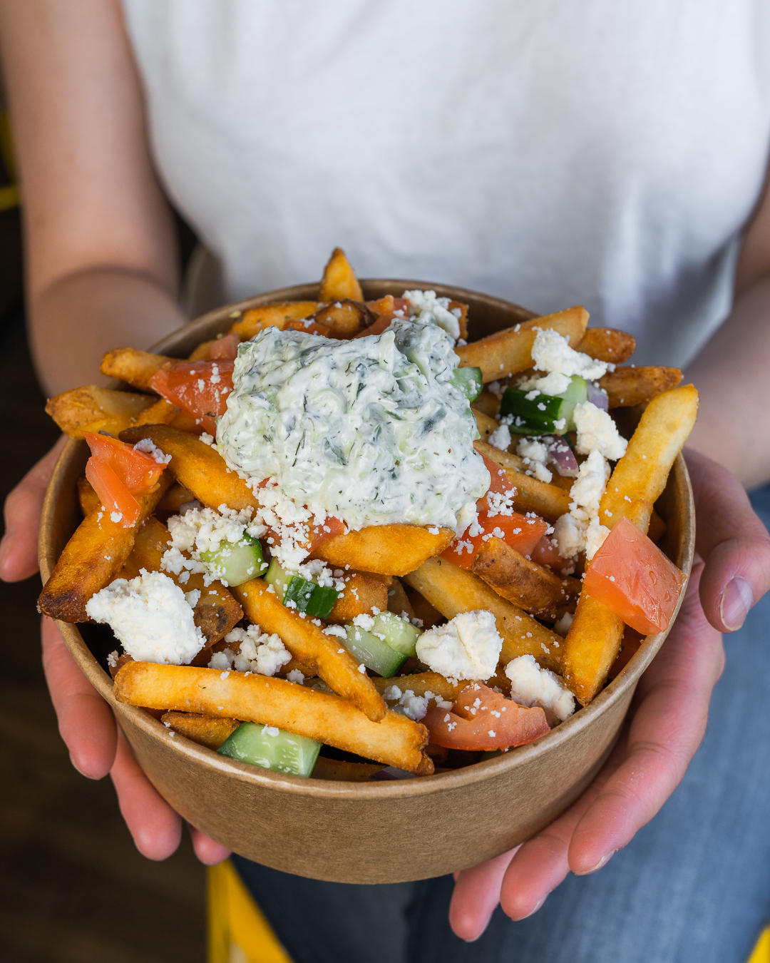 Greek Fries with Tzatziki, tomatoes, red onion, cucumber, and feta Joey's Fish Shack Camrose (780)673-0164