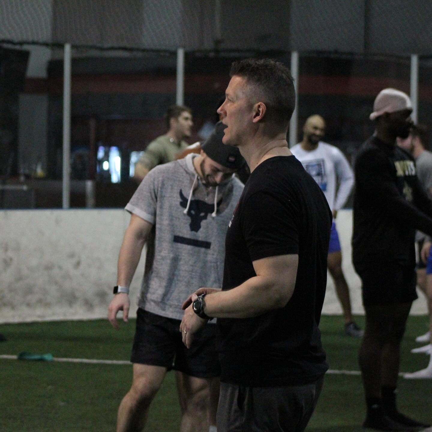 Coach Jim Kielbaso coaching NFL Combine athletes during speed and performance training at Impact Sports Performance