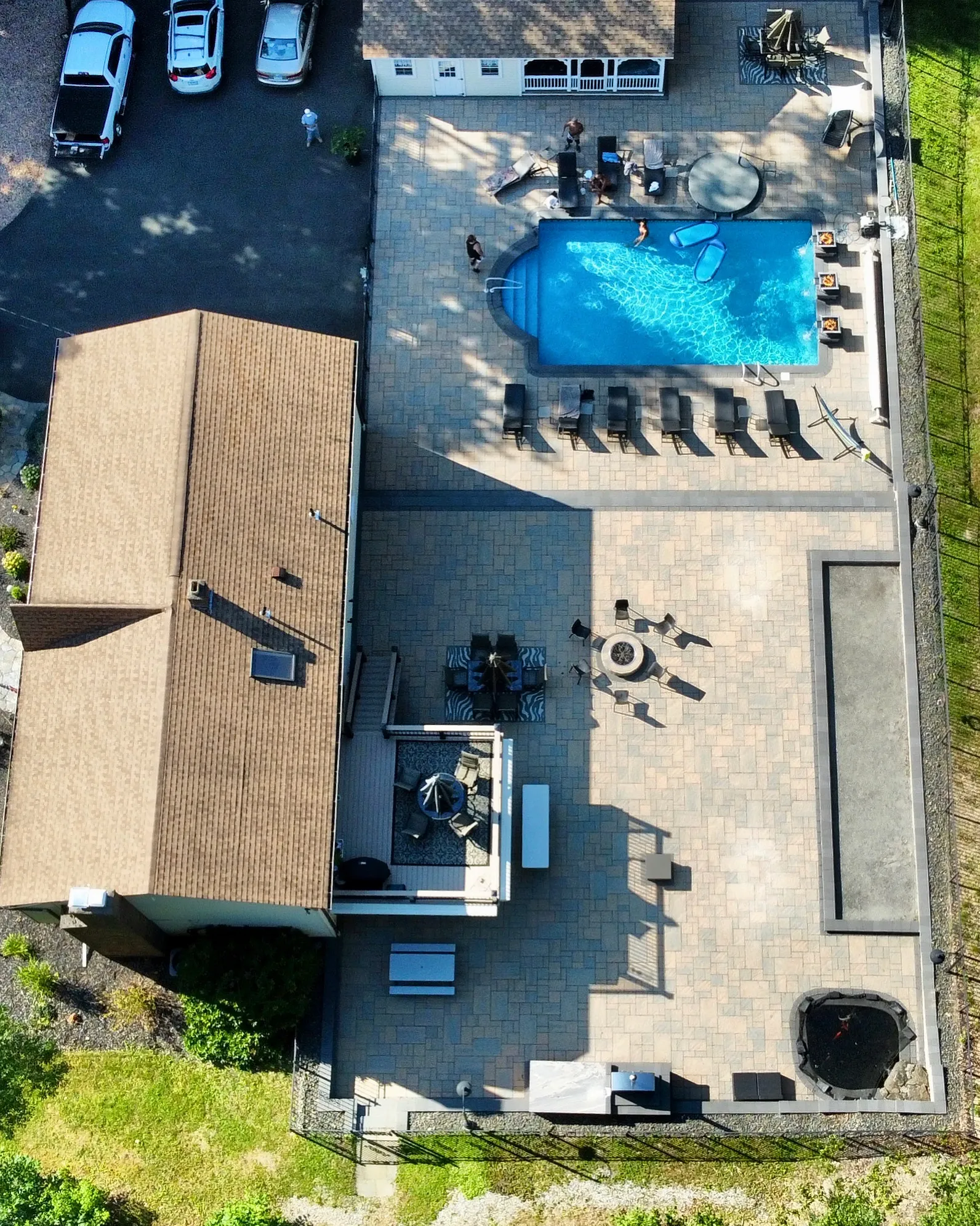 Poolside pavers and coping detail - Paver Pool Decks project by General Masonry LLC.