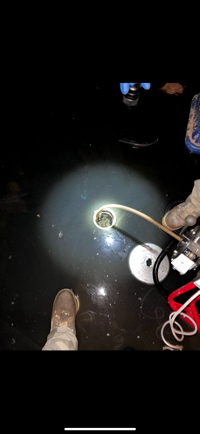 Clearing main drain in Edison, New Jersey.