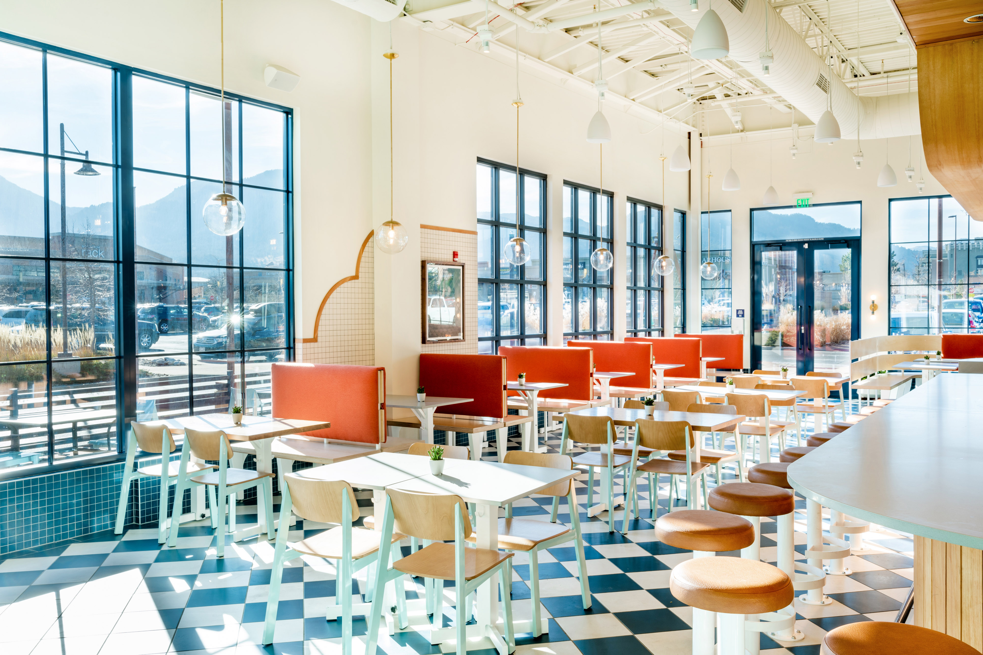 Interior of Birdcall Boulder, highlighting the mountain view from the dining room.