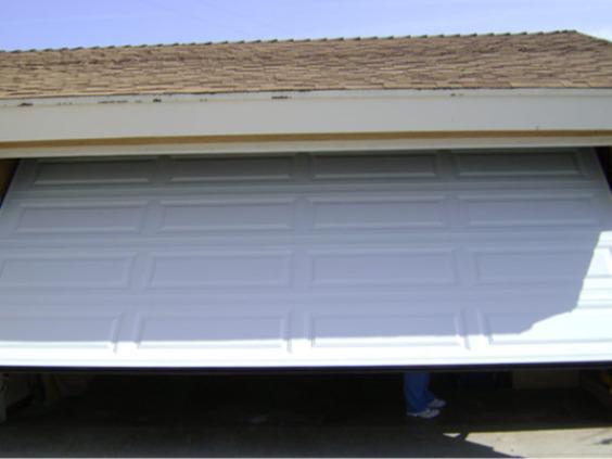 Lopez Garage Door Service -spring manual garage door