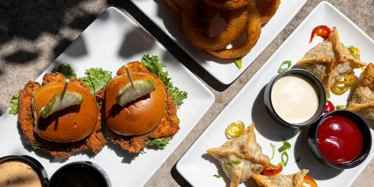 Happy Hour Sampler | pick any three happy hour items | Bacon Lolli Pops, Onion Rings, Chicken Sliders, Cheesesteak Wontons or Buffalo Chicken Bites
