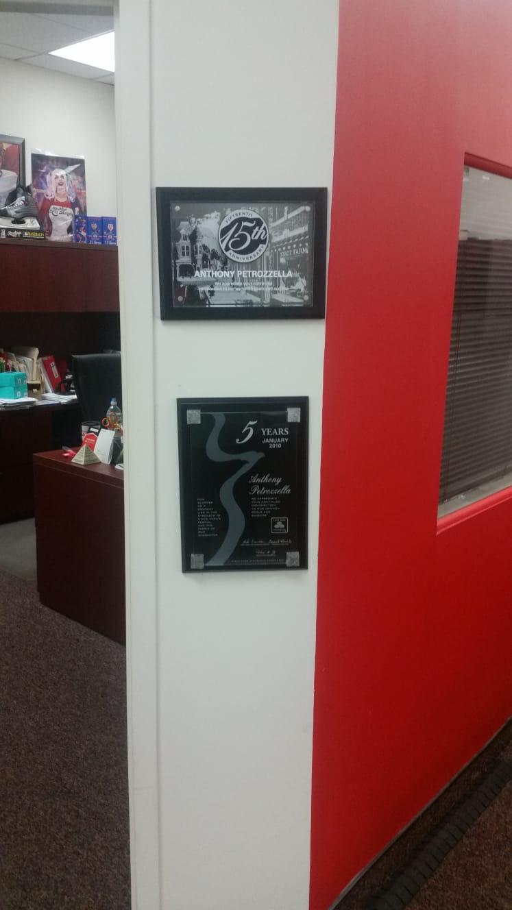 Proudly displaying our agency's plaques
