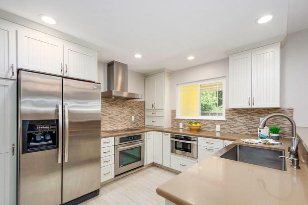 Images Amber Hom Realm Real Estate