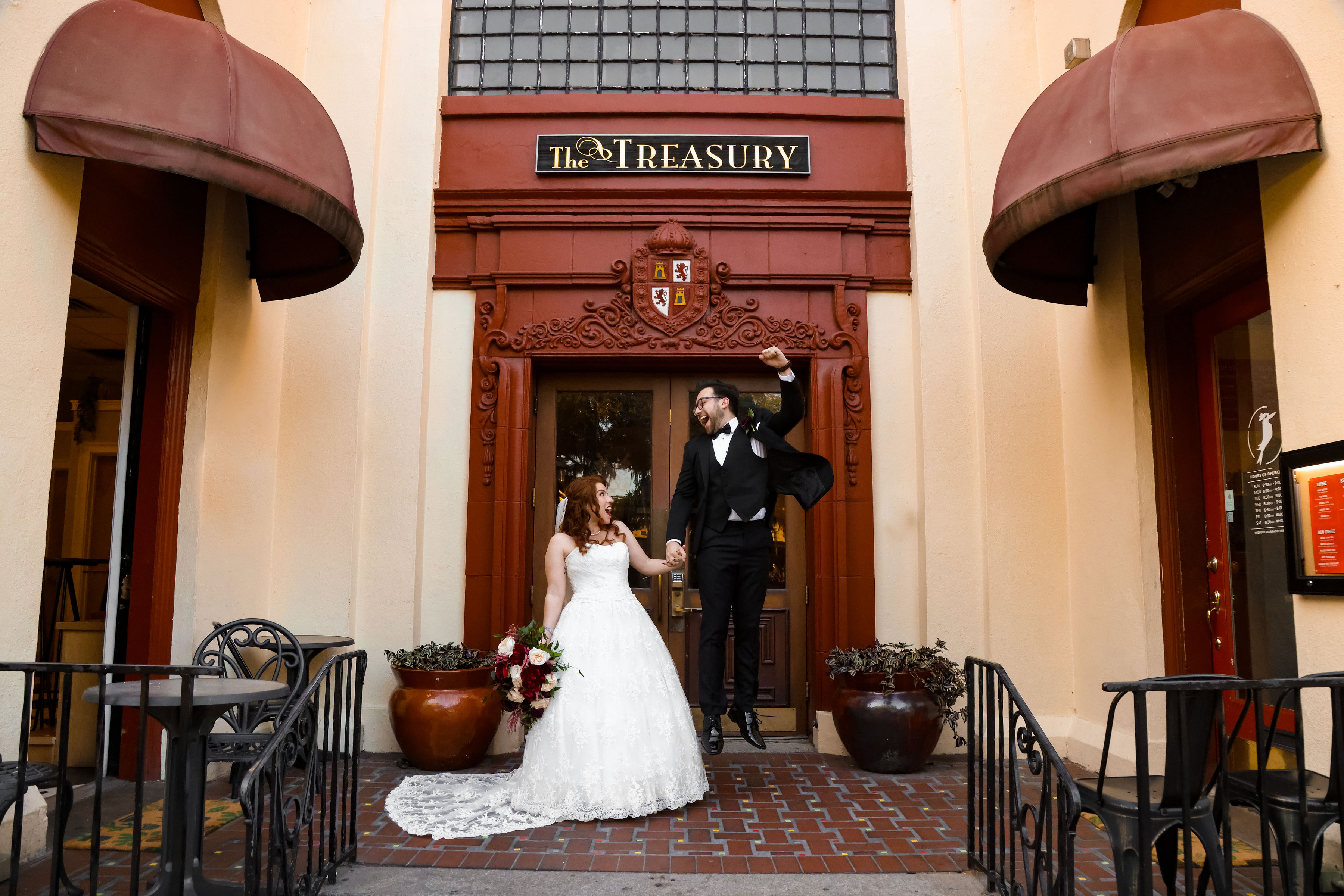 couple celebrating outside the treasury in st augustine 