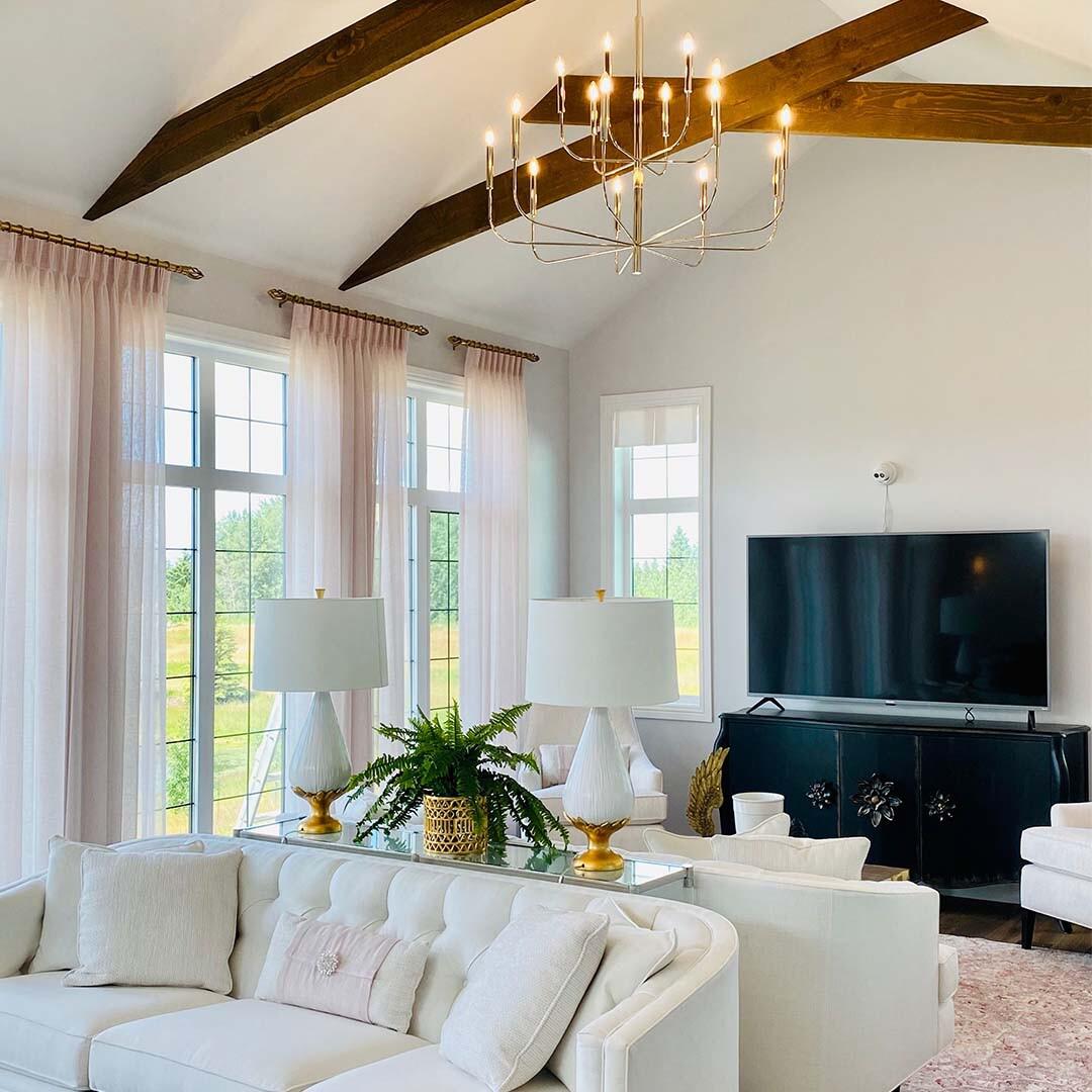 Want to make elegant, large rooms appear even bigger? Sheer drapery panels make windows appear even taller and allow plenty of sunlight to enter, keeping things bright and airy.