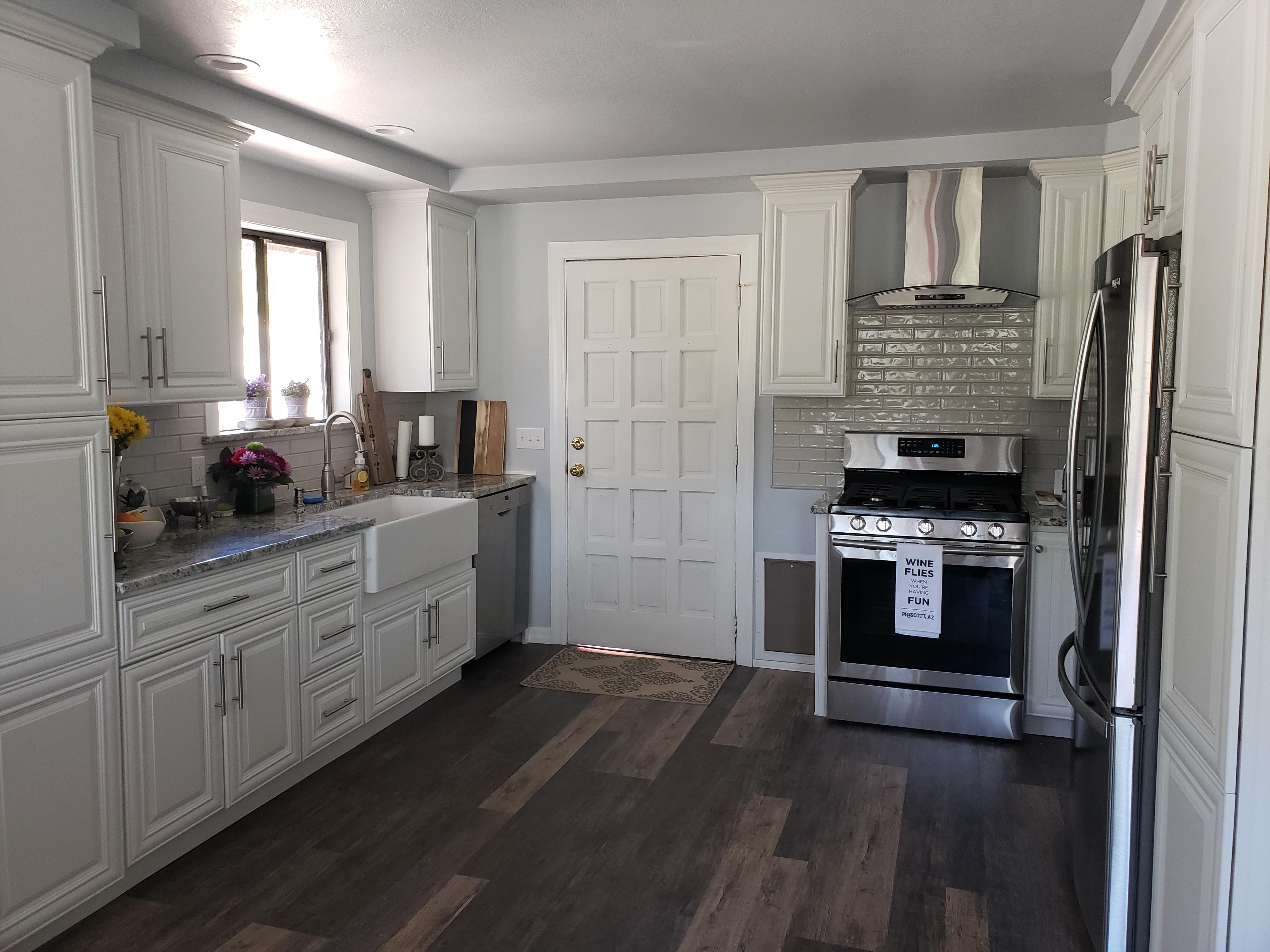 Jim Higgin's &amp; Sons Construction LLC Logo