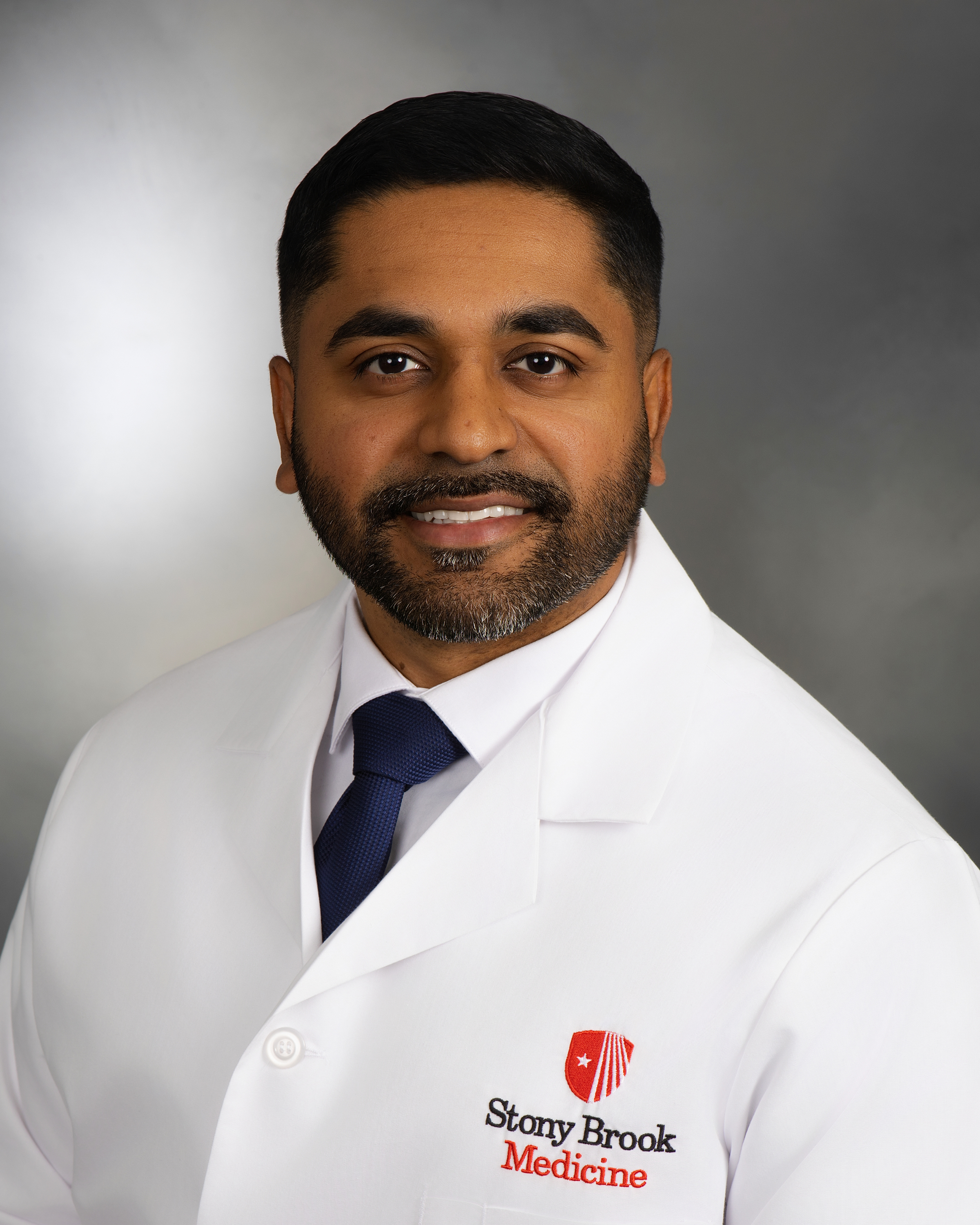 Bestin Kuriakose, DO, professional headshot 