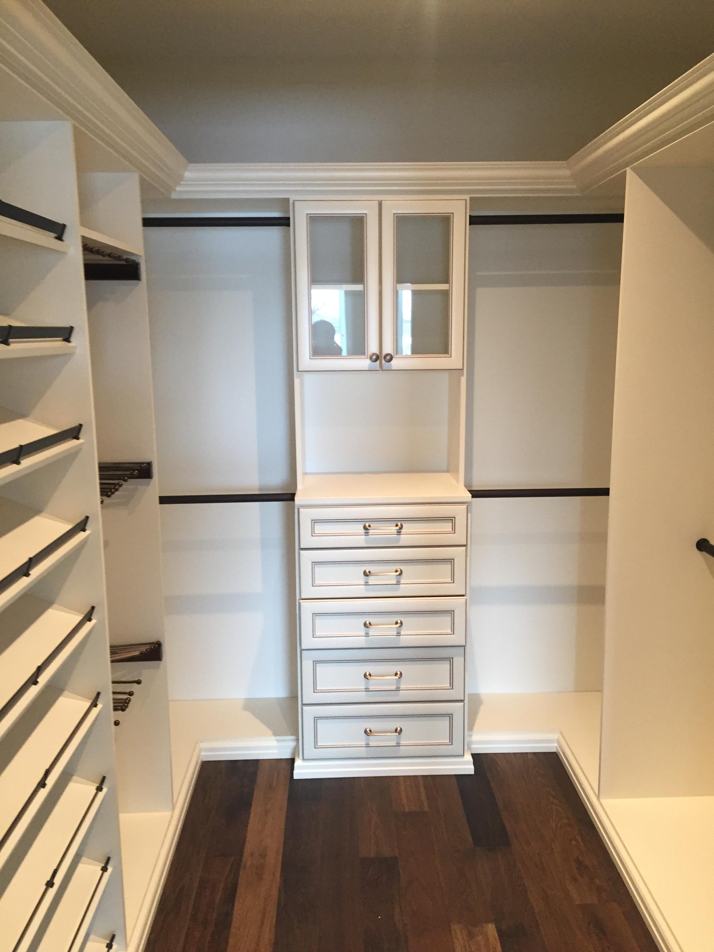 Master Closet installed in Osborne Village in Antique White with shoe storage, pant racks and drawer The Tailored Closet of Winnipeg South Winnipeg (204)808-8852