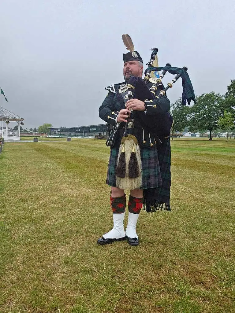 Images Andrew Paton Highland Bagpiper