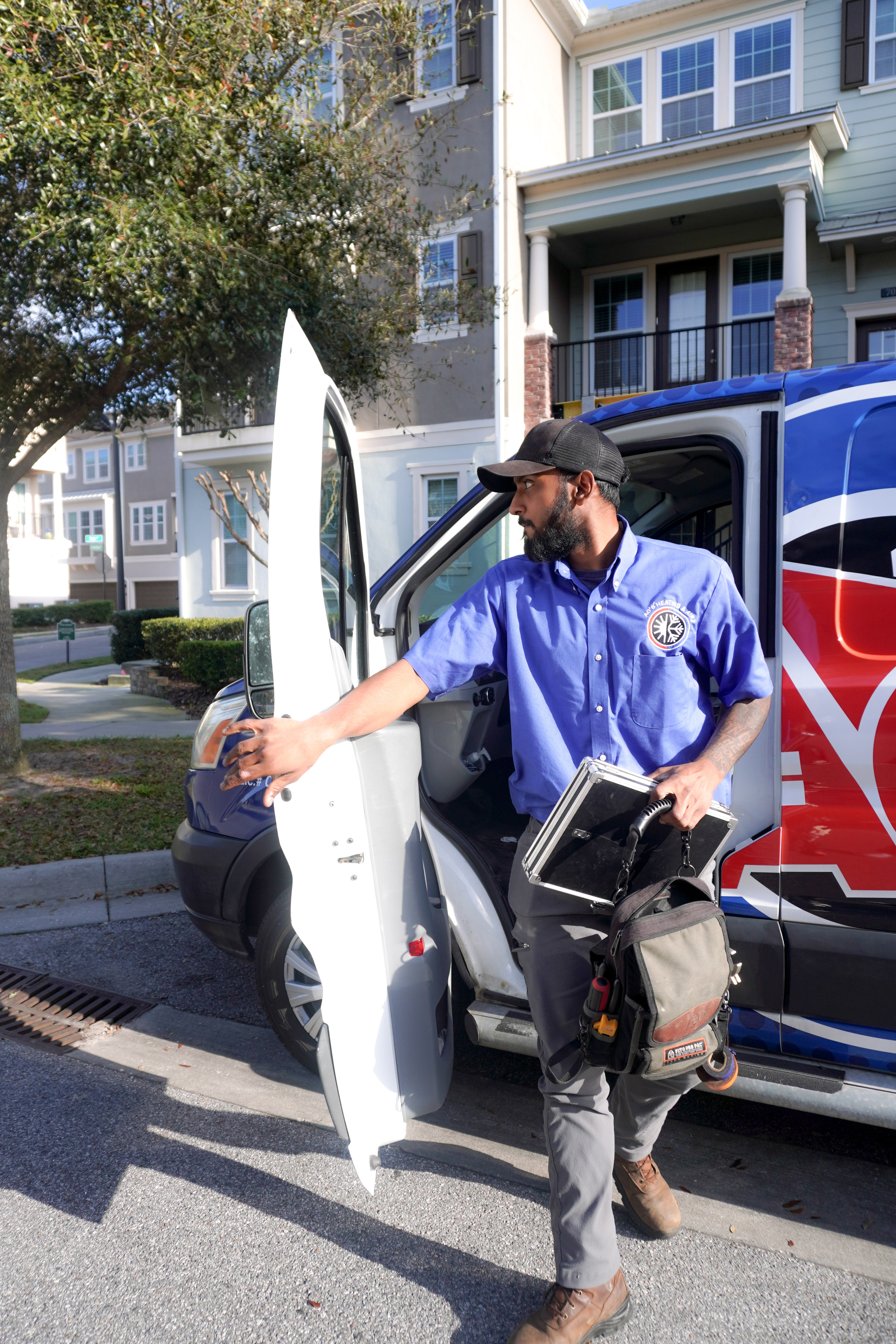 AC's Heating & Air technician getting ready to perform a service