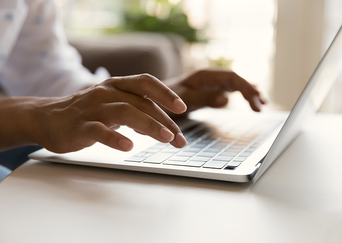 A client accessing their CRA account on their laptop.