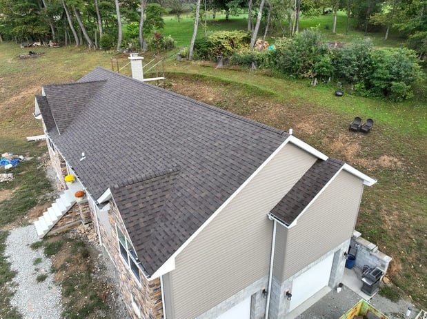Images Nail'Em Down Roofing