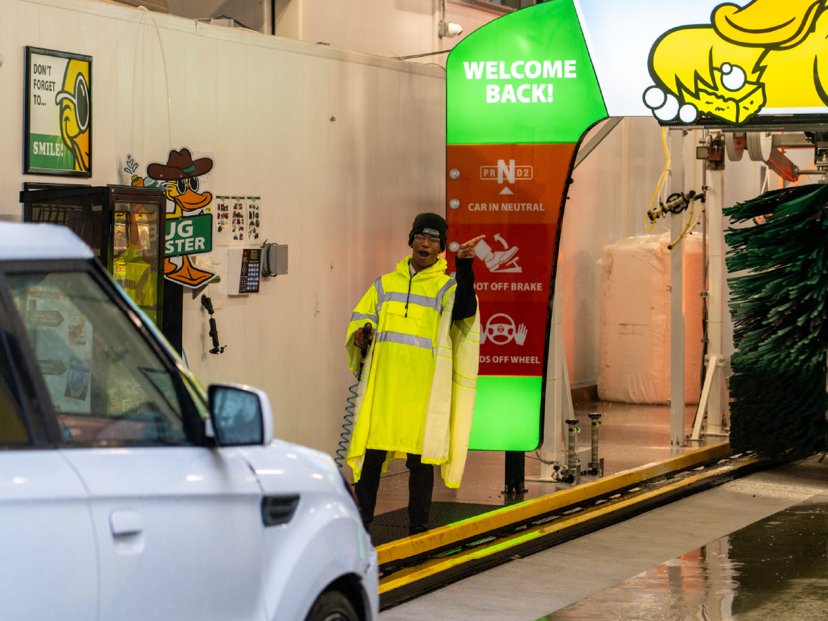 Quick Quack Car Wash team members guide every vehicle safely onto the conveyor track so your wash goes smoothly from start to finish. Rain or shine, our crew is on the job.