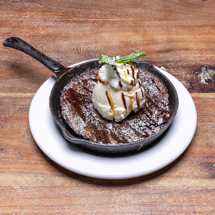 Warm Gooey brownie | Rich Vanilla ice cream | Drizzled w/ chocolate | Whipped cream 