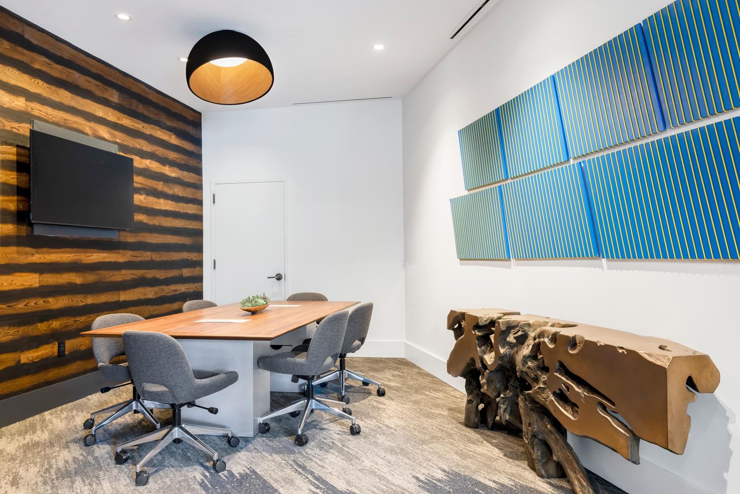 Bringing the outdoors, indoors with an elegant wood-inspired conference room.