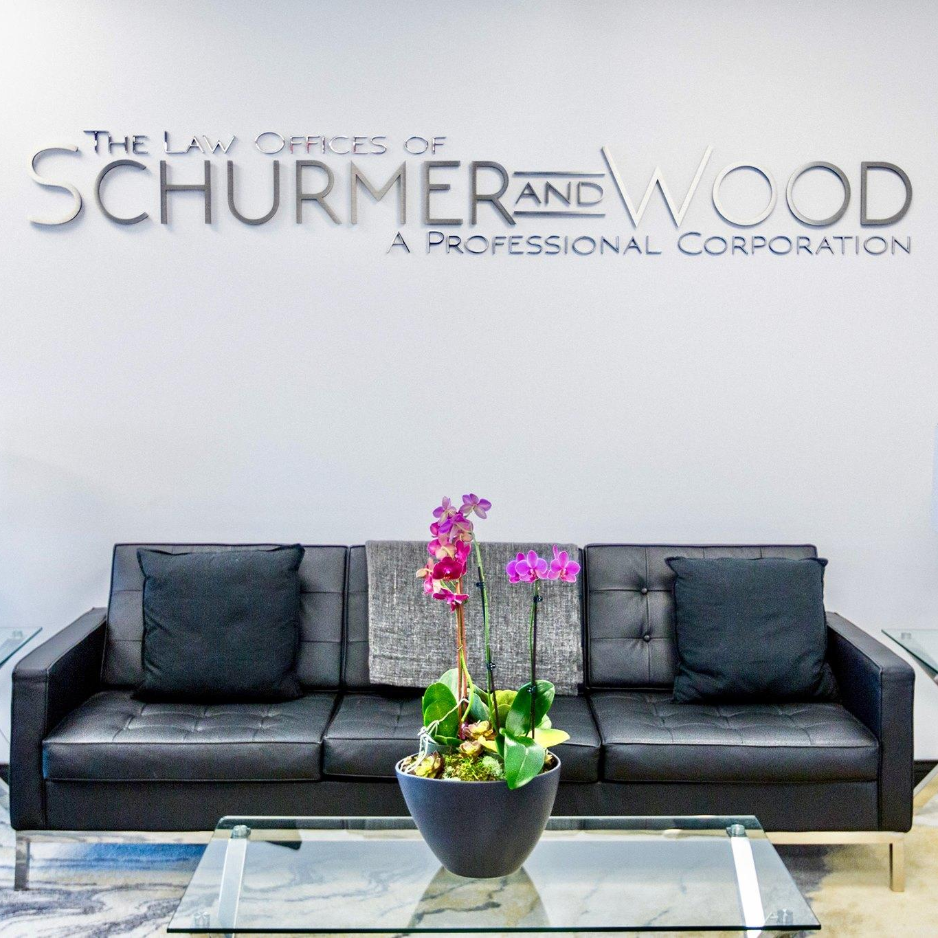 The Law Offices of Schurmer and Wood Logo