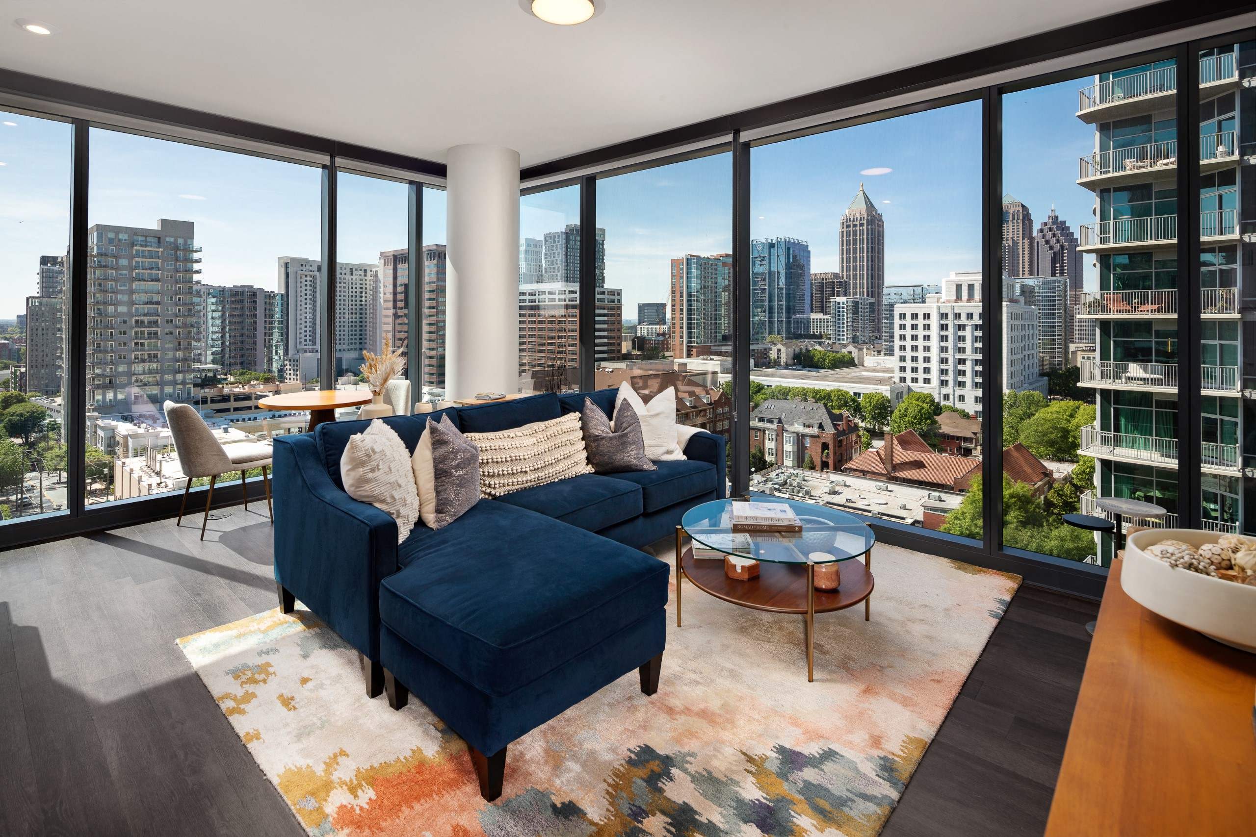 Living room area with view and couch 