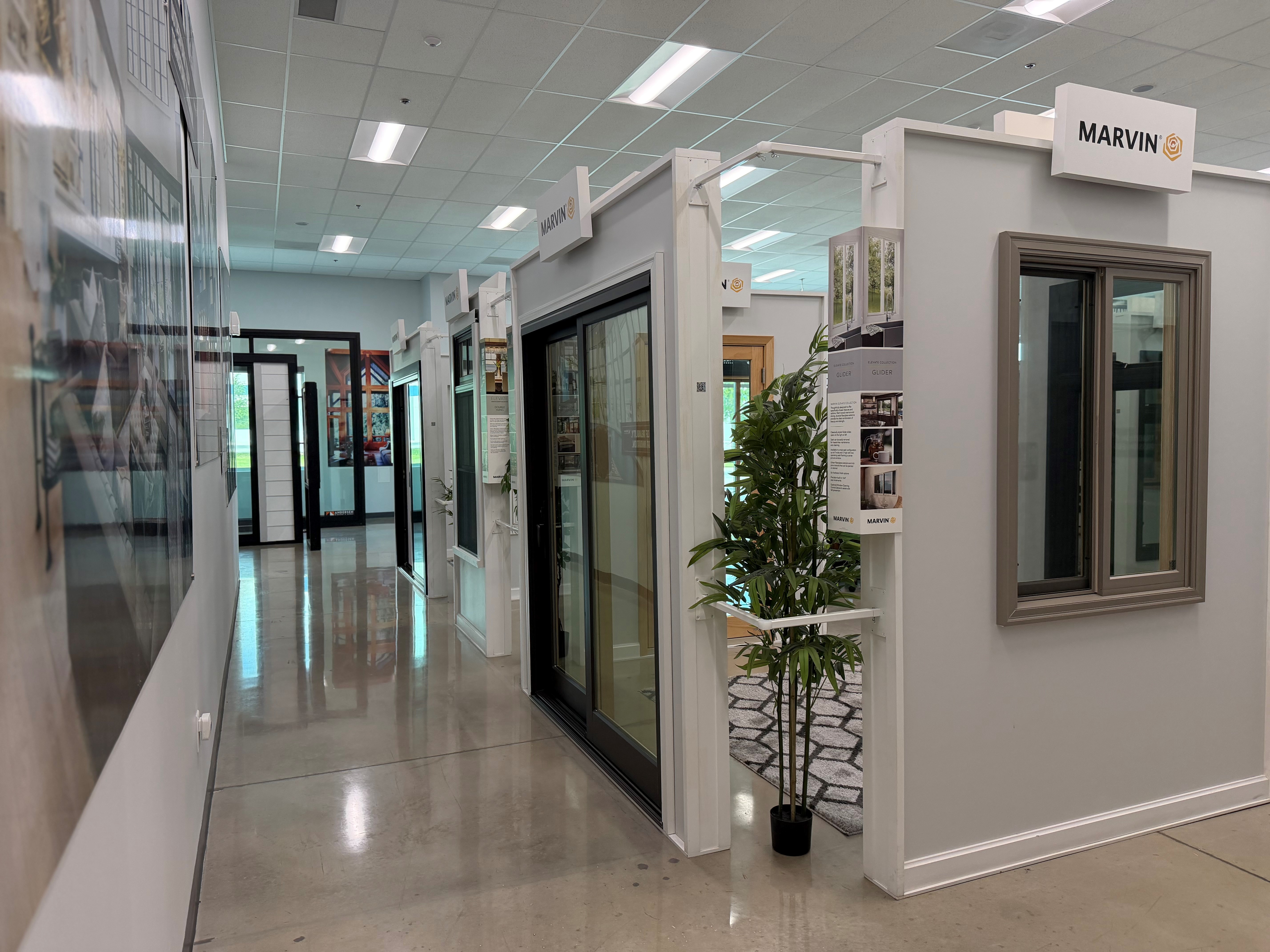 Marvin window and patio door displays inside the Builders FirstSource Premium Window Showroom, featu 