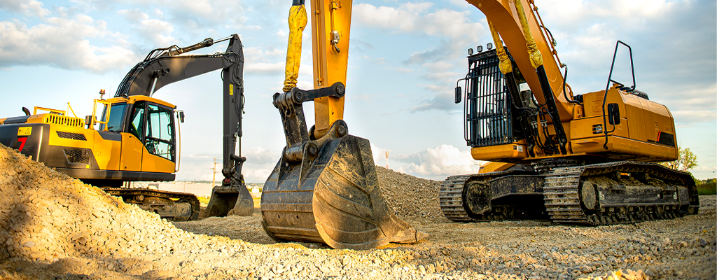 Two excavators on a construction site.