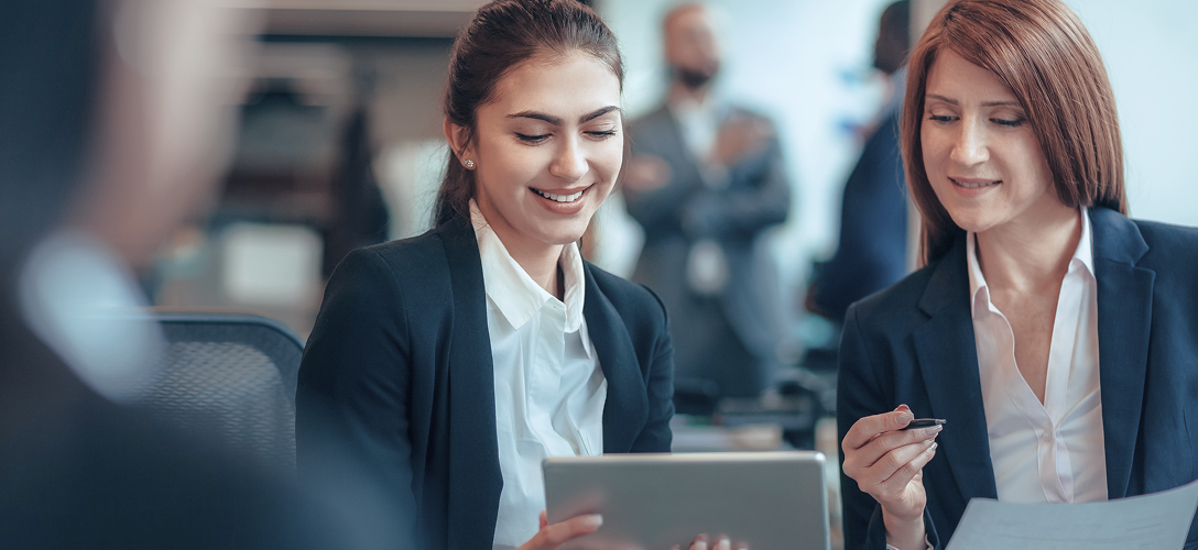 Premier bankers reviewing statements.