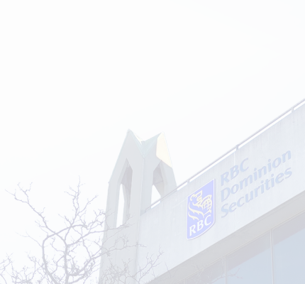 Close-up shot of an RBC Dominion Securities logo on the side of a building.