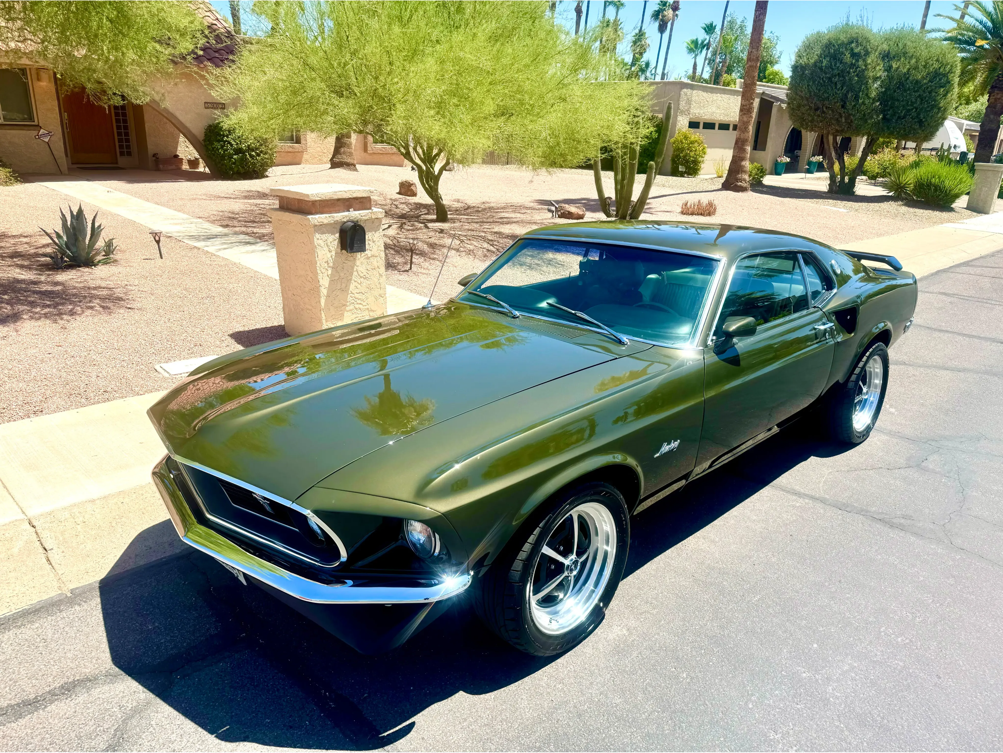 Classic 1969 Ford Mustang after mobile paint correction and detailing, Phoenix AZ driveway 