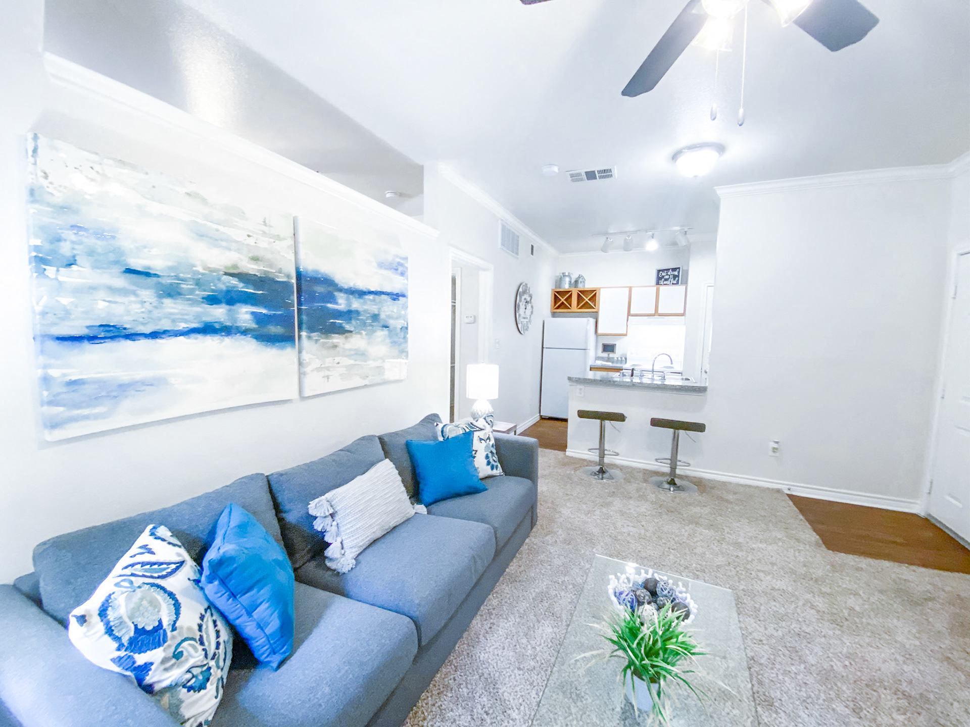 Living room view with kitchen countertop