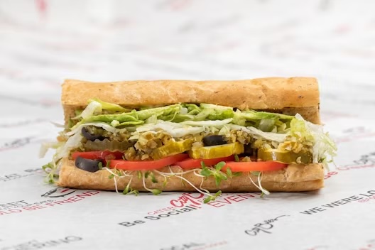 Avocado, alfalfa sprouts, lettuce, tomatoes, red onions, pickles, black olives, crushed cherry peppers, blended oils, City Bites' ranch dressing, salt & pepper.