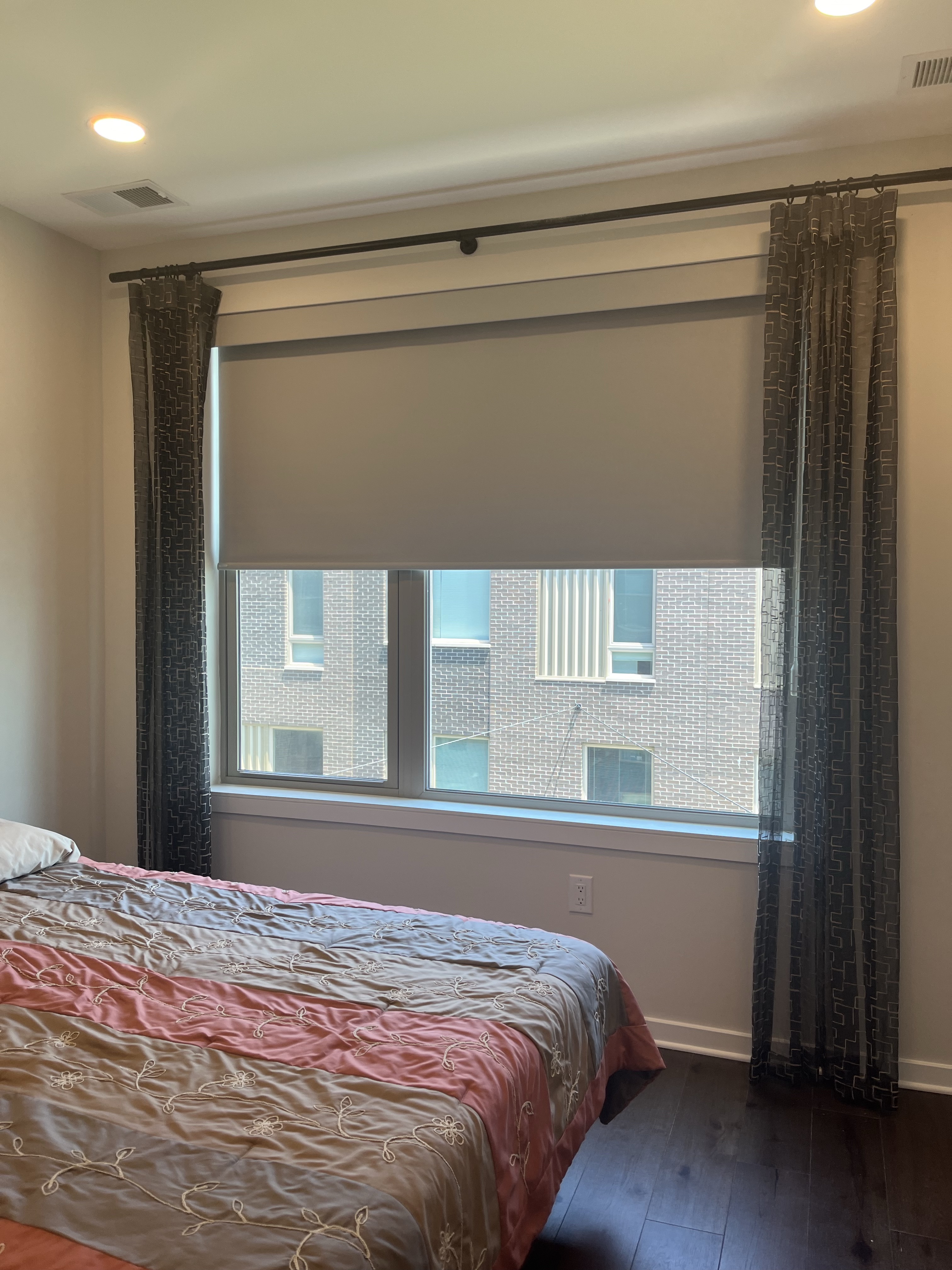 Room darkening roller shades are a great option for any bedroom!